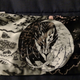 While the back side has this monochrome map/insignia design.